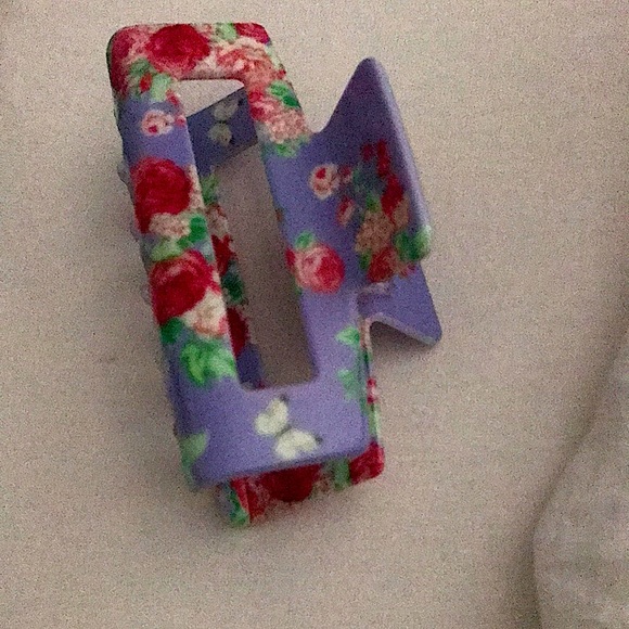 This is a beautiful purple, green, and red hair clip that works like magic! - Picture 1 of 3